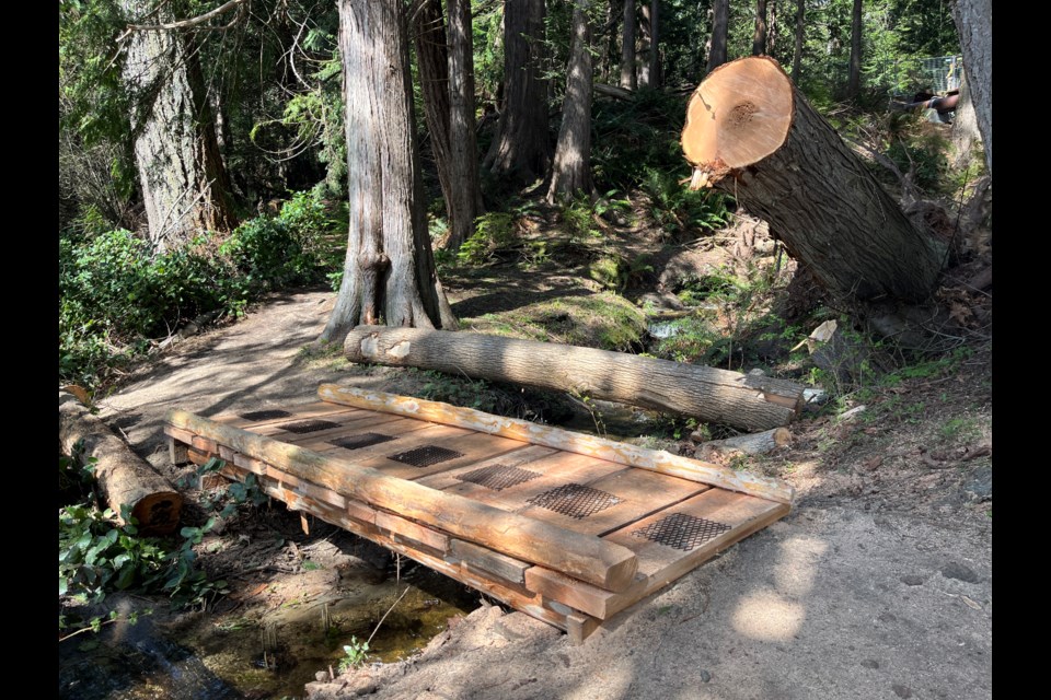 BRIDGE REPAIRED: The footbridge below the Second Beach trestle on the Willingdon Trail has been repaired using wood from the tree that fell in a storm a couple of months ago.
