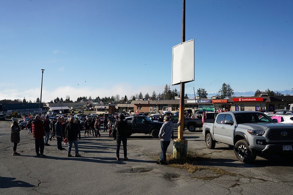GROUP ASSEMBLES: "Freedom convoy" participants gathered in the parking lot where the Inn at Westview used to stand and sang O Canada prior to heading off to Wildwood to show support for convoys that have occurred in several strategic locations around the country.                        