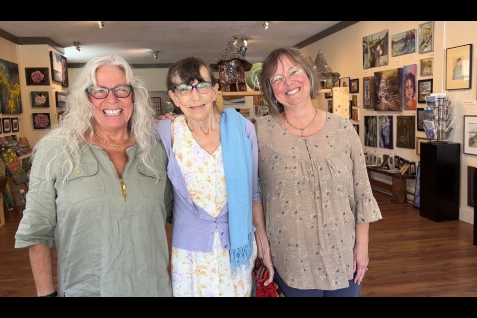 SUMMER SALON: Since the year 2000, Artique, in various locations, has been a refuge for local artists to display their work. [From left] art collective members Eve Jones, Gwen Welp and Janet Southcott.
