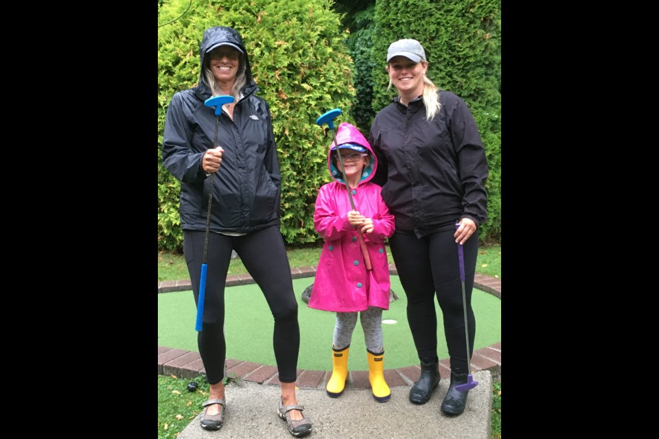 HAPPY GOLFERS: Participants tried their best putts playing mini-golf at a PROWLS fundraiser last Friday (August 11).
