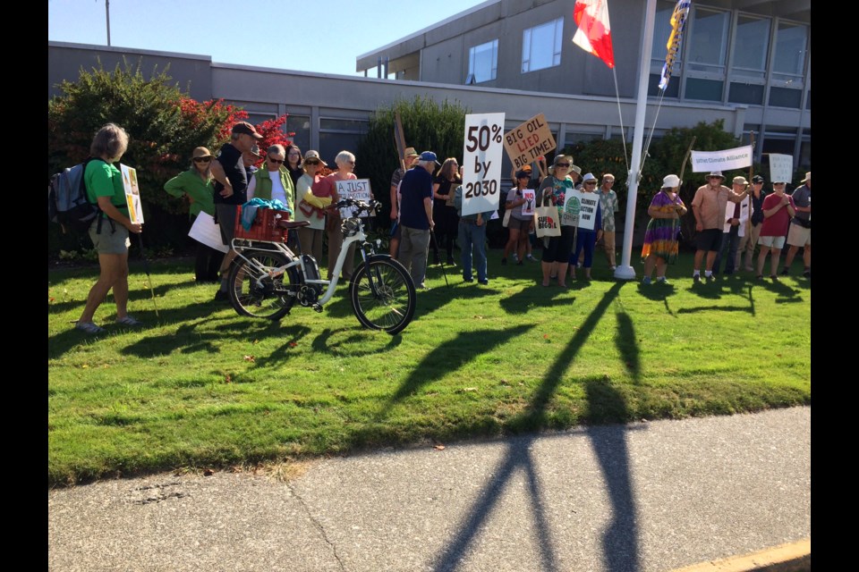 CLIMATE GATHERING: qathet Climate Alliance and several other groups concerned about greenhouse gas emissions, gathered at Powell River City Hall on Friday, September 15. The groups walked to the plaza on the corner of Marine and Alberni.
