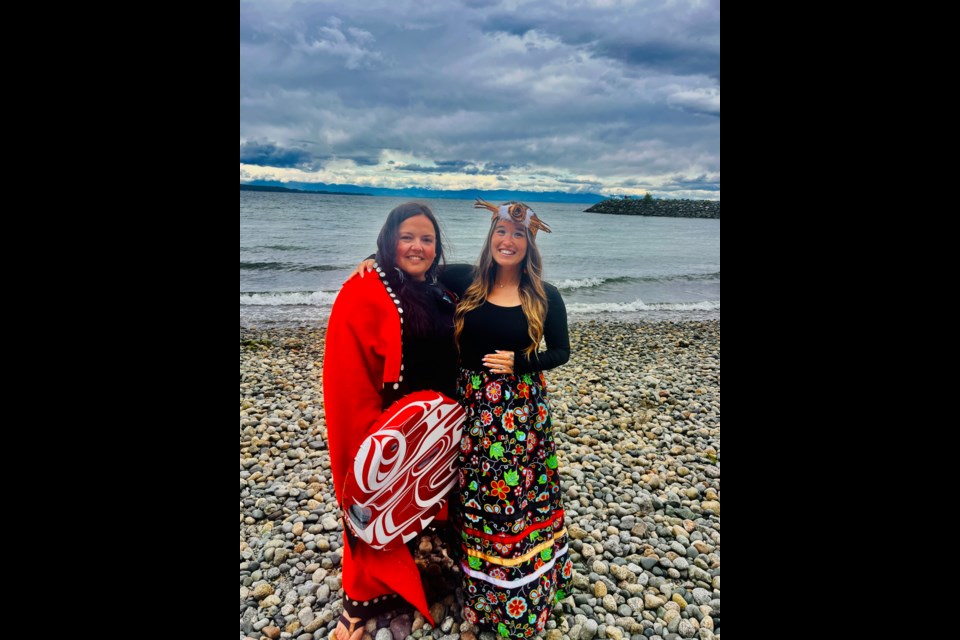 TEACHERS OF PROTOCOL: Tla'amin Nation employee Tara Tipton [left] and Tla’amin member Frankie Mcwade took part in a qathet School District event at Willingdon Beach on Wednesday, June 18, in honour of National Indigenous Peoples Day (June 21).
