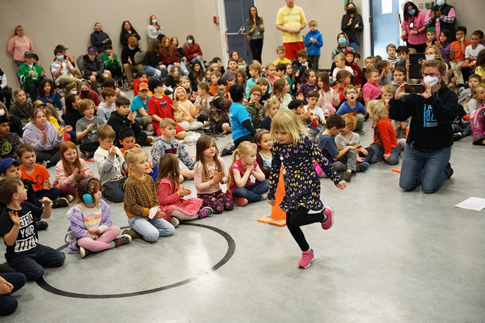 GREAT VARIETY: Stepping out in front of a school assembly for Edgehill’s Got Talent is student Norah Stam, who was one of many in-person and virtual performers in the annual talent show. The exercise is designed to allow students to show their performing skills and to help them build confidence.                               