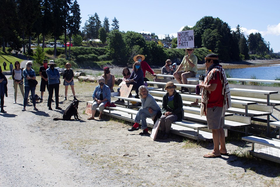 TREE TALK: Tla’amin executive council member Erik Blaney [right] gives a speech at an ancient forest solidarity rally on May 29 in Powell River.