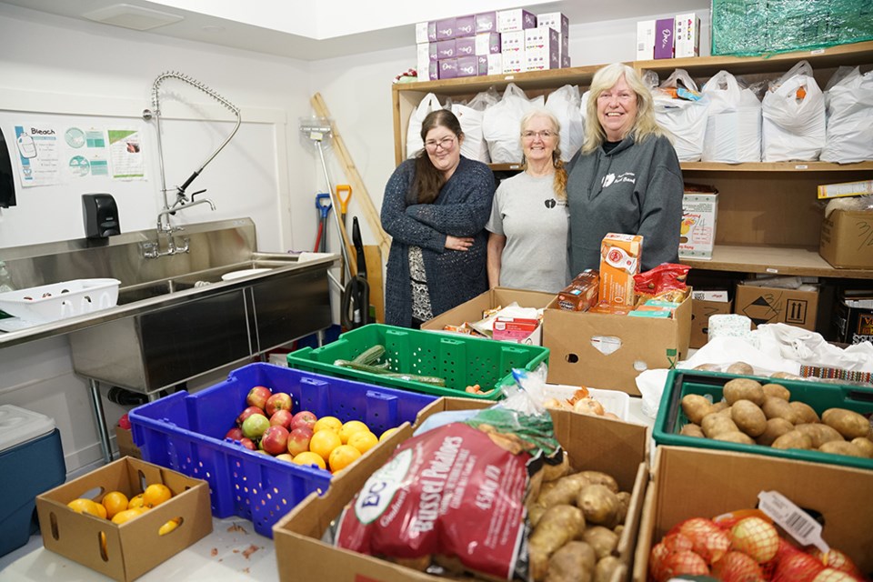 POVERTY REPORT: Powell River Action Centre Food Bank workers [from left] Melissa Tookey, Donna Rekve and manager, Savanna Dee. Last month, Food Banks Canada released poverty report cards for all 10 provinces and three territories. BC received a D-plus, citing that more needs to be done for affordability.