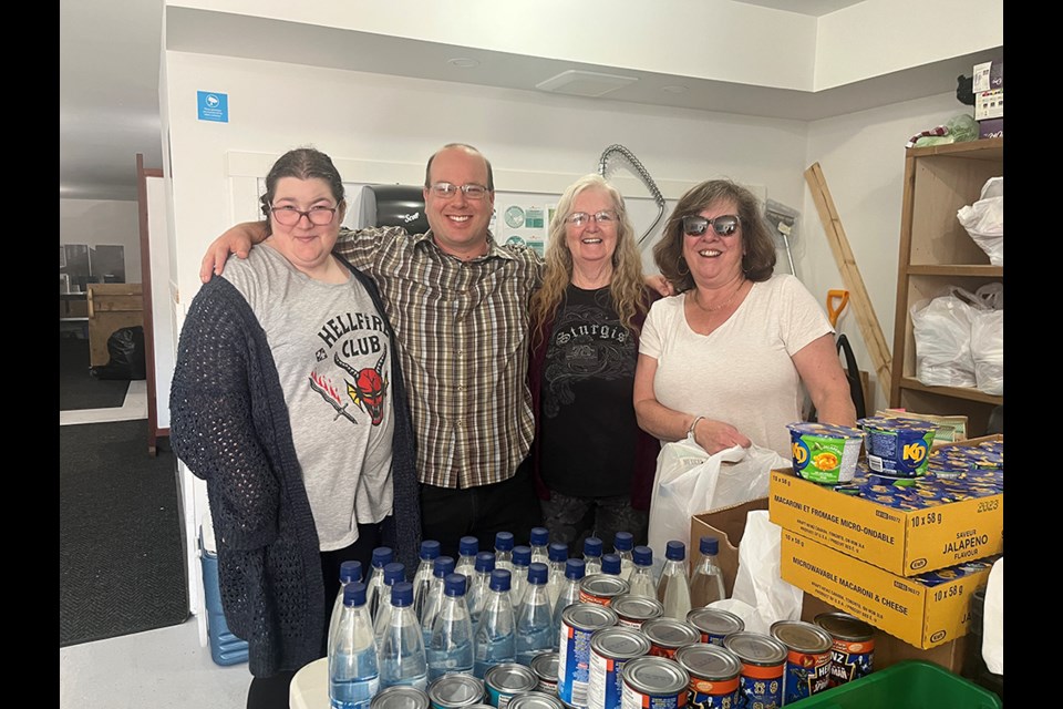 TIGHT TEAM: [From left] Melissa Tookey, Ryan Southern, Donna Rekve and Susan Mazlin are all volunteers at Powell River Action Centre Food Bank, located on Alberni Street. 