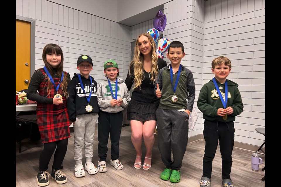 CELEBRATING SUCCESS: [From left] Powell River Skating Club members Scarlett Townley, Rivers Martin, Dax Ellis, coach Shay Sarton, Caden Ladner and Benson Smisko celebrated the season's accomplishments at an awards ceremony on April 11.