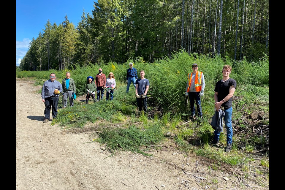 An initiative to eradicate Scotch broom led volunteers to the Penticton trails area recently to remove the invasive and highly flammable plant.