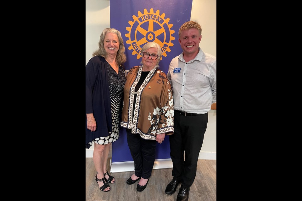 DOUBLE INSTALLATION: New District 5040 governor Jan Gisborne [left] and Rotary Club of Powell River president Matt Wate [right] were installed by former Rotary International vice-president Dean Rohrs on June 14.