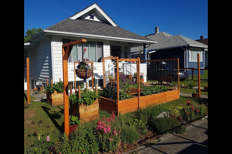 Homeowner Kate Dryden was recognized with the Best Kitchen Garden award for 2020 by Townsite Heritage Society.