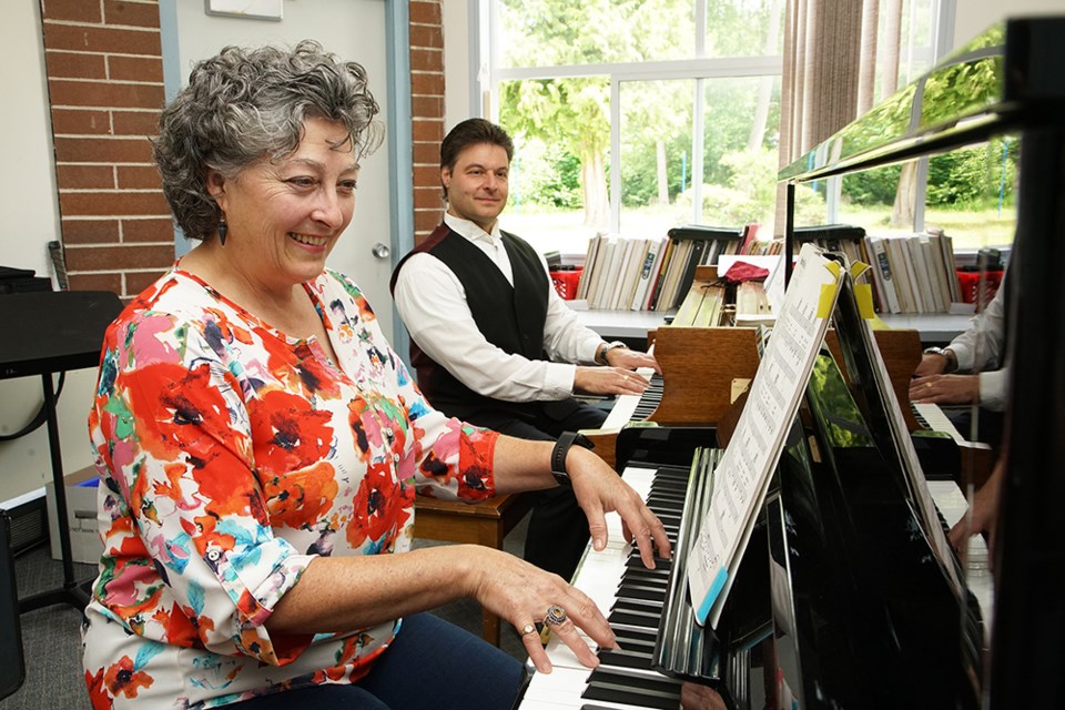 MUSICAL DUET: Sara Mitchell-Banks, with piano instructor Walter Martella, is honing her music skills at Powell River Academy of Music.                         