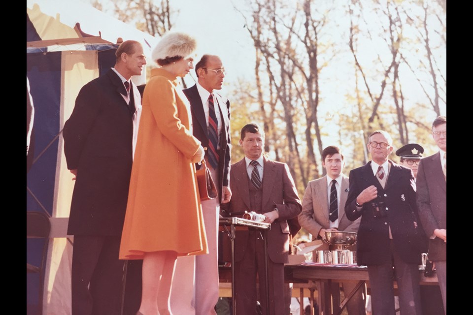 Former Powell River mayor and retired naval officer Stewart Alsgard [fourth from left] met Queen Elizabeth II and Prince Philip in 1977.