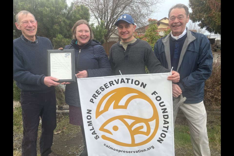 SALMON AWARD: Rachel Blaney, North Island-Powell River MP, was awarded a lifetime membership to Powell River Salmon Society on Friday afternoon (March 3). Beside her, [from left] were Gord Jones, Powell River Salmon Society treasurer; Shane Dobler, hatchery manager; and Rod Tysdal, vice president.