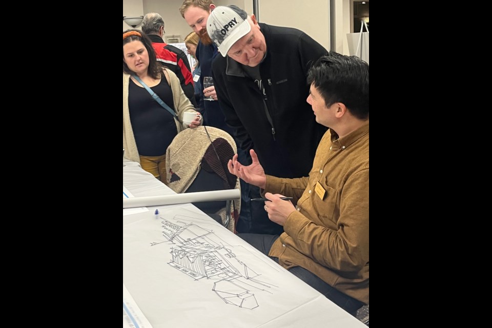 DESIGN WORKSHOP: Landscape architect 
and urban designer Derek Lee sketches ideas participants have about the downtown plan for City of Powell River