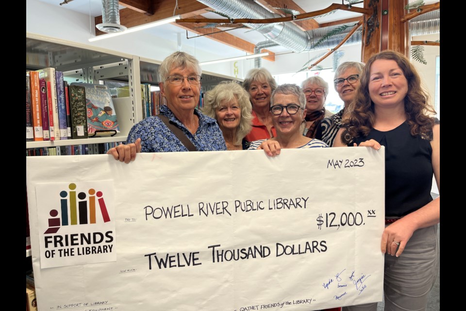 FRIENDS MAKE A DONATION: qathet Friends of the Library Society members including [from left] Julie Thorne, Jose Rodger, Maureen Tierne, Jacquie Donaldson, Joyce Furness and Lynda Harris, recently made a donation to Powell River Public Library, which was presented to chief librarian Rebecca Burbank [right]. Absent at the time of the presentation was longtime fundraiser and friends of the library member Brownie Brown.