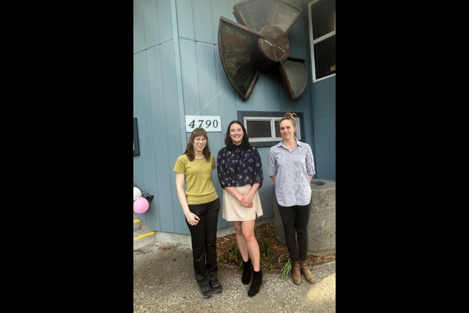 MUSEUM DAY: qathet Museum and Archives recently hired two assistant curators: Marry Williams [left] and Ava Hansen [right], who posed outside the facility with visitor services assistant Carolyn Smith on International Museum Day (May 18).

