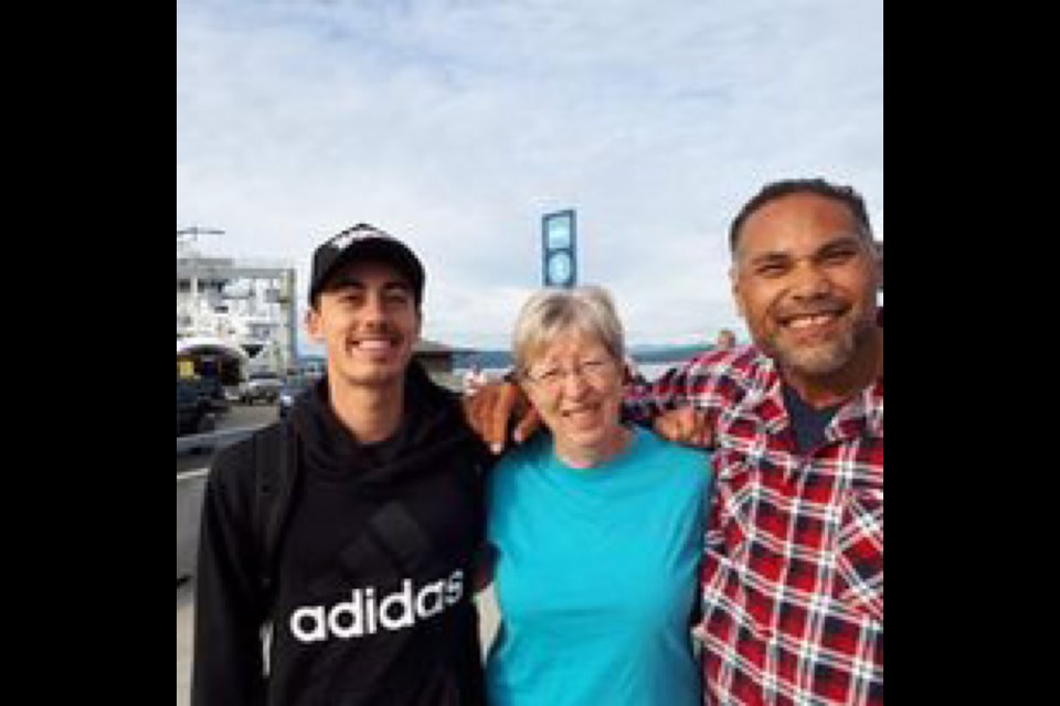 MAKING FRIENDS: [From left] Aiden Young, Norma Hawrys and David Leha. Hawrys took in billets from the Australian Choir during International Choral Kathaumixw in 2018. 
