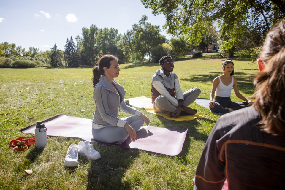 SITTING TOGETHER: Practicing silent meditation in a group can be beneficial and motivating to participants.
