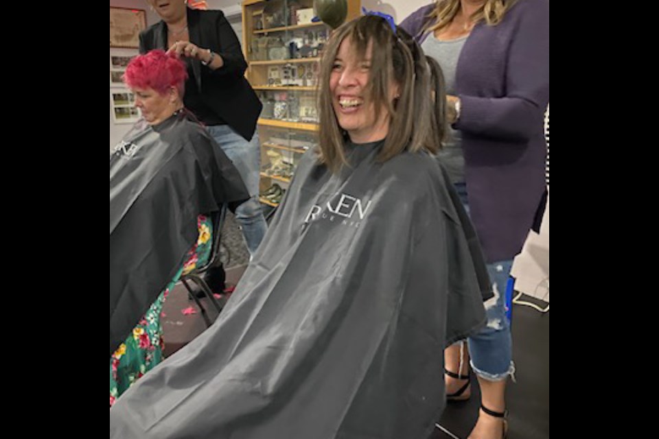 HEAD SHAVED FOR CHARITY: Powell River RCMP constable Paula Perry shaved off her hair for charity during a Cops for Cancer cycling event fundraiser at Royal Canadian Legion Branch 164 on September 18.