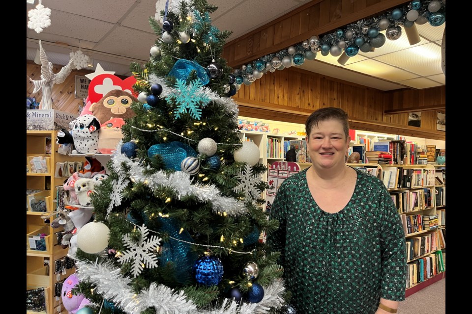 CHRISTMAS CHEER: Owner of Oceanside Entertainment Karyne Bailey said just under $1,000 was collected to buy games and toys for the Christmas Cheer campaign. Next year she hopes to start the game/toy drive earlier.