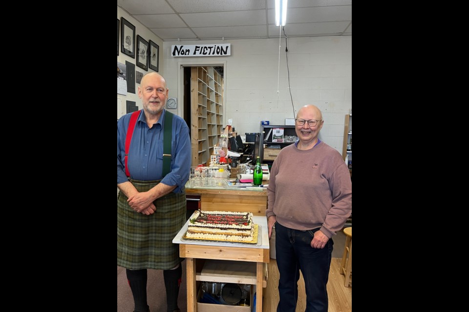 COMMUNITY CONNECTORS: Since finding out they would have to close up shop Peter [left] and Sharon Deane have given away most of their book supply.