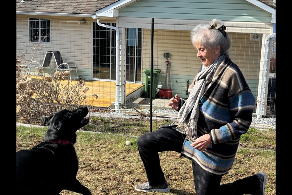 ENJOYING LIFE: Author Hannah Main-Van Der Kamp recently moved from south of town to Westview with her husband and dogs. She reads poetry, writes and plays with her dog named Guappa every day.