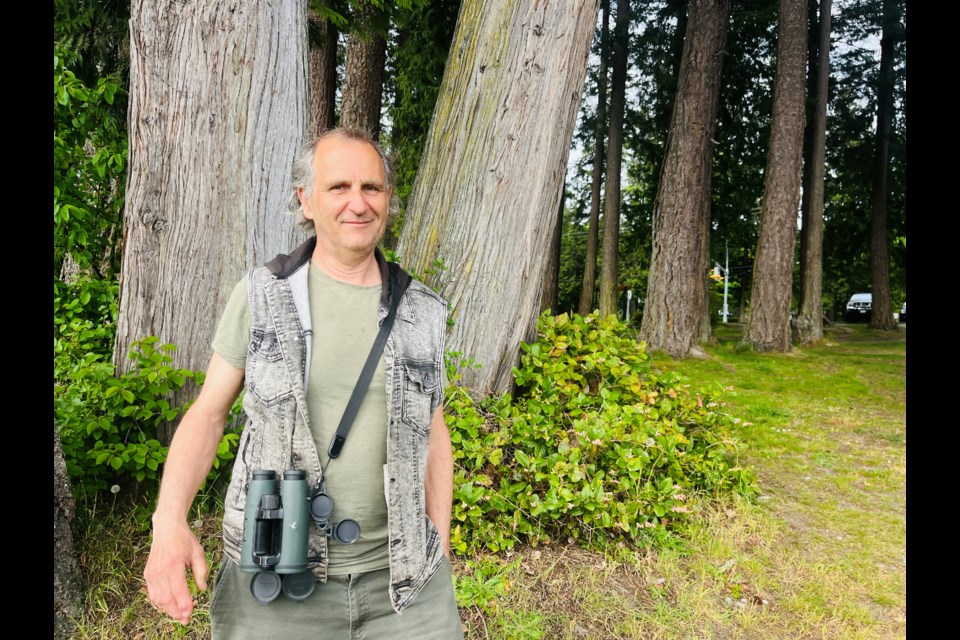FOR THE BIRDS: Birder and bird enthusiast Pierre Geoffray said this time of year is peak time to hear and see migrating bird species, such as warblers.
