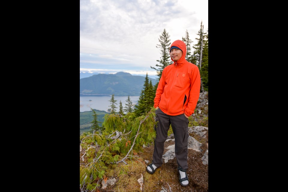 DAY HIKES: Author of 105 Hikes In and Around Southwestern BC, Stephen Hui, at Walt Hill on the Sunshine Coast Trail.
