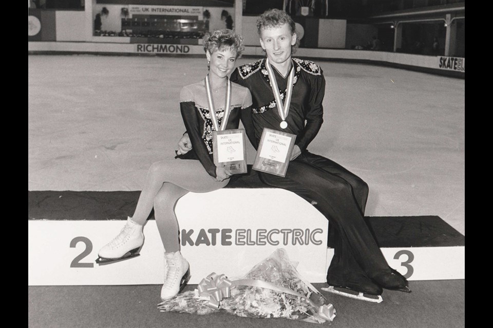 ELECTRIFYING DUO: Douglas Ladret and Christine Hough celebrate their win at the Skate Electric International in Richmond, England, in 1990. At the time, it was one of the top-level international events in the world for figure skating.