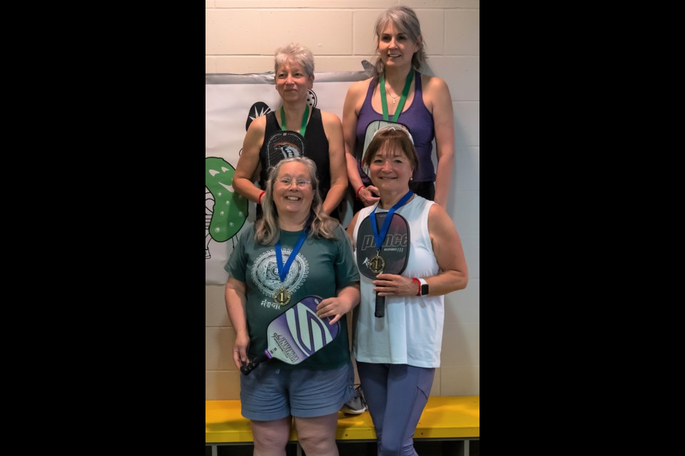 PODIUM PLACERS: Carmen Brown [top left] teamed with Colleen Reedel [top right] while Mary Charters [bottom left] and Sharon St. Laurent [bottom right] entered a pickleball tournament in Gibsons earlier this month and came home with medals.