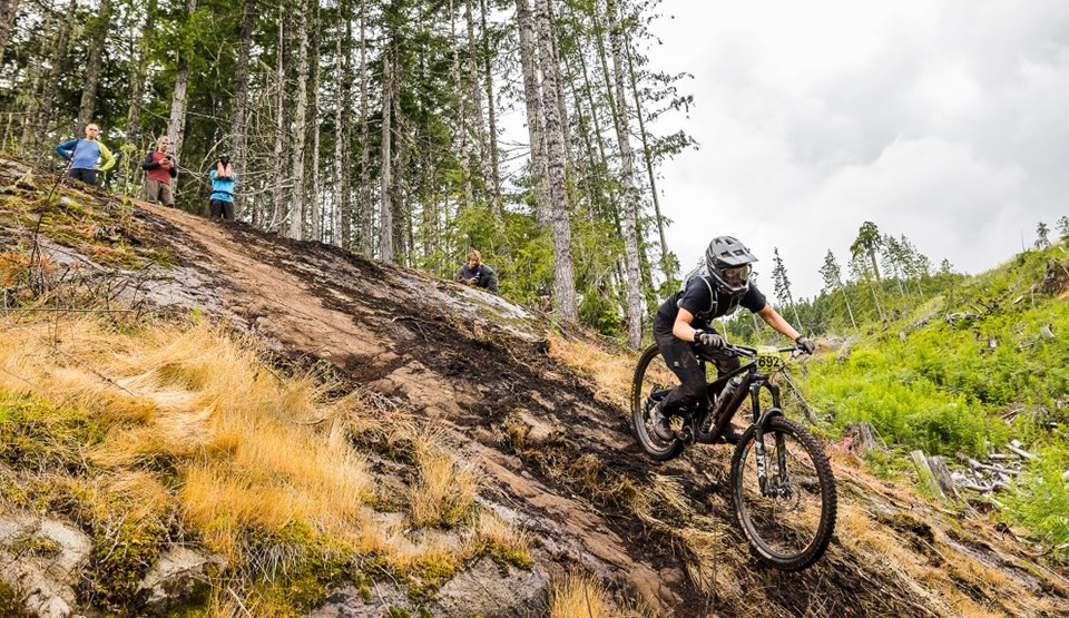 TOUGH SLOPE: Cycling racer Sophia Ervington will be competing in the downhill and Enduro World Series this year after some great performances in BC, such as this Cumberland/Mount Washington series race in July 2022. The rock slab was one of the toughest parts of the course, with one-third of racers crashing. Ervington made it down and ended up with the win.