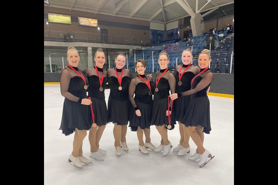 PODIUM POSITION: Team Cosmopolitan members [from left] Kim Rowbotham, Leanne Maximnuk, Keltie Jenkins, Rachelle Ford, Sheena Deveau, Lisa Wilson and Sarah McClean, recently won a bronze medal at the 2023 Mountain Regional Synchronized Skating Championships in Burnaby.