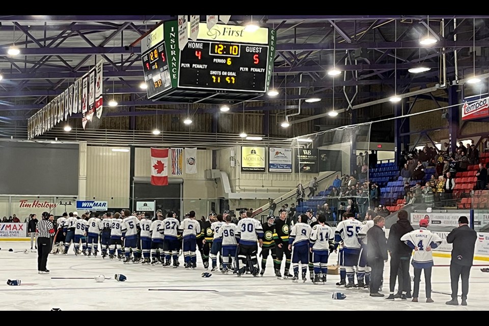 Terrace River Kings' and Powell River Regals' players shake hands after an epic Coy Cup championship game at Hap Parker Arena on March 30.