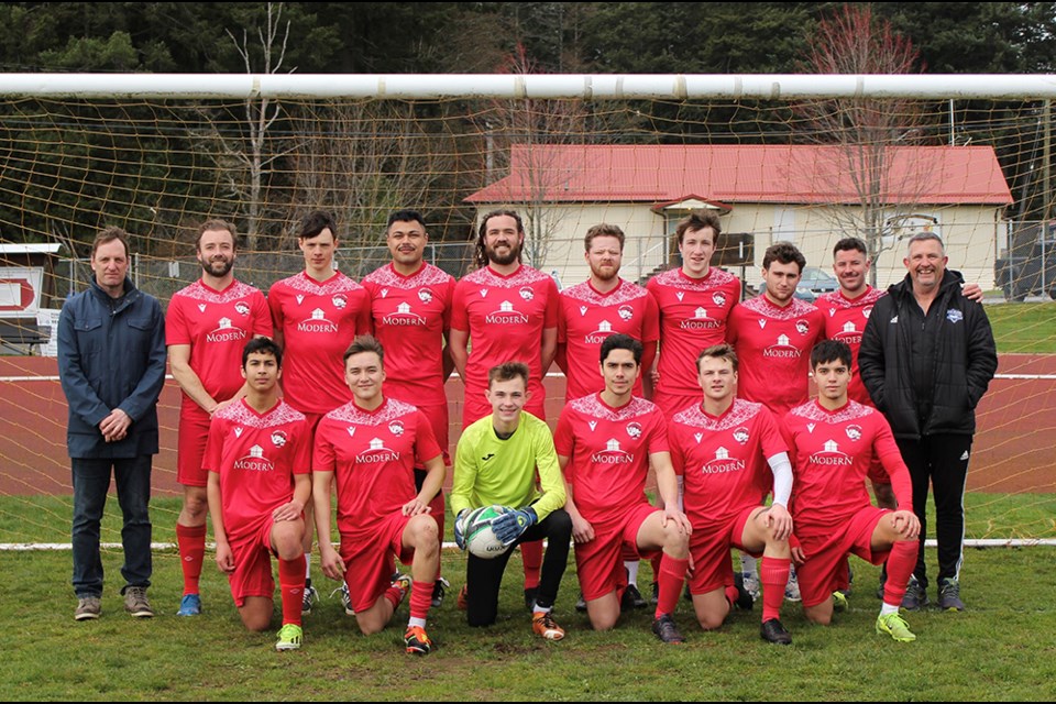 Powell River Villa players posed with manager Chris McDonough [standing, left] and coach Tony Leach [standing, right] prior to the final match of the Vancouver Island Soccer League season at Timberlane Park on March 29.