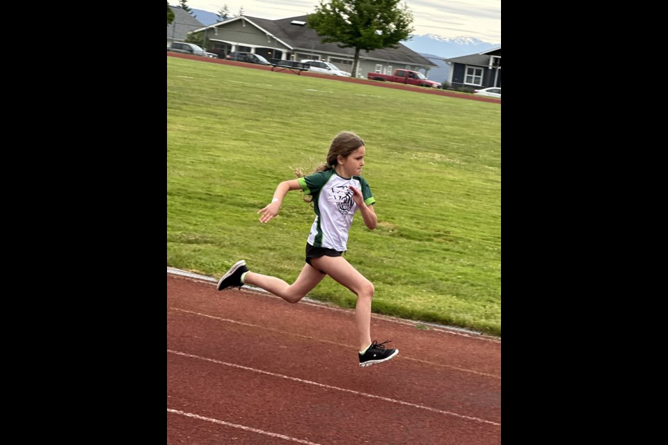 Audrey Statham, a grade three student at Powell River Christian School, races along the track during the annual qathet School District track meet on May 30.