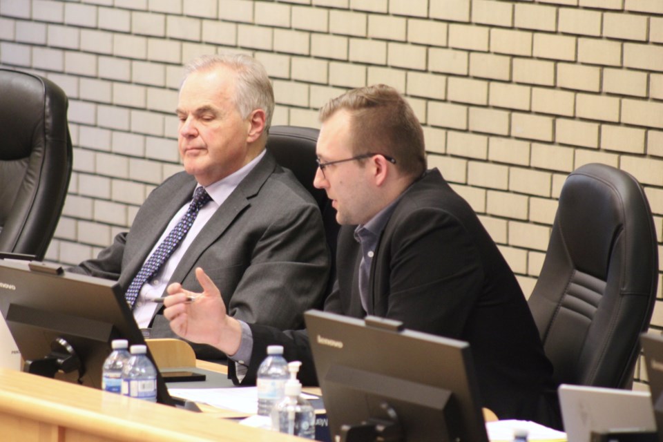 Director of administrative services Eric Depenau (right) discusses city administration's desire to install vehicle gates on Lower Patricia Boulevard at the Wednesday, April 23, 2025 meeting of Prince George city council.