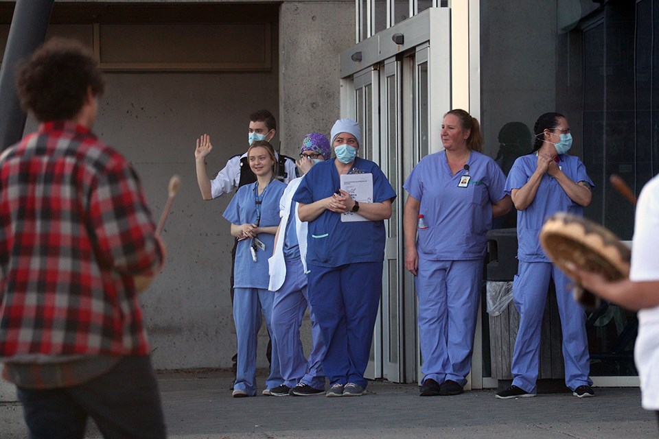 Nurses and healthcare professionals at UHNBC come outside to express gratitude for Prince George cheers during the COVID-19 pandemic. (via Kyle Balzer)