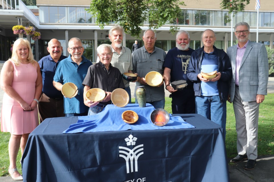 Spirit of the North Healthcare Foundation receives 12 pieces of woodwork that used to be trees in front of Prince George city hall (via Kyle Balzer)