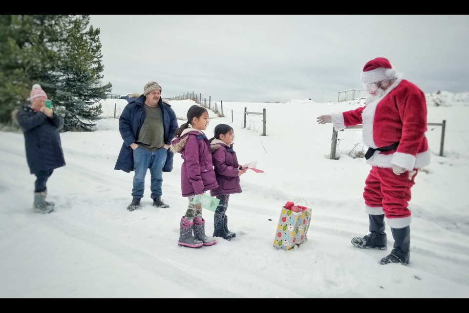 Santa and the Salmon Valley Volunteer Fire Department delivered gifts to children in the community. 