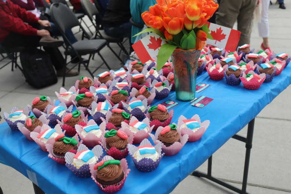 The cupcakes sat around a vase full of bloomed tulips with Canadian flags as symbol of unity and honour for lost veterans (via Kyle Balzer)