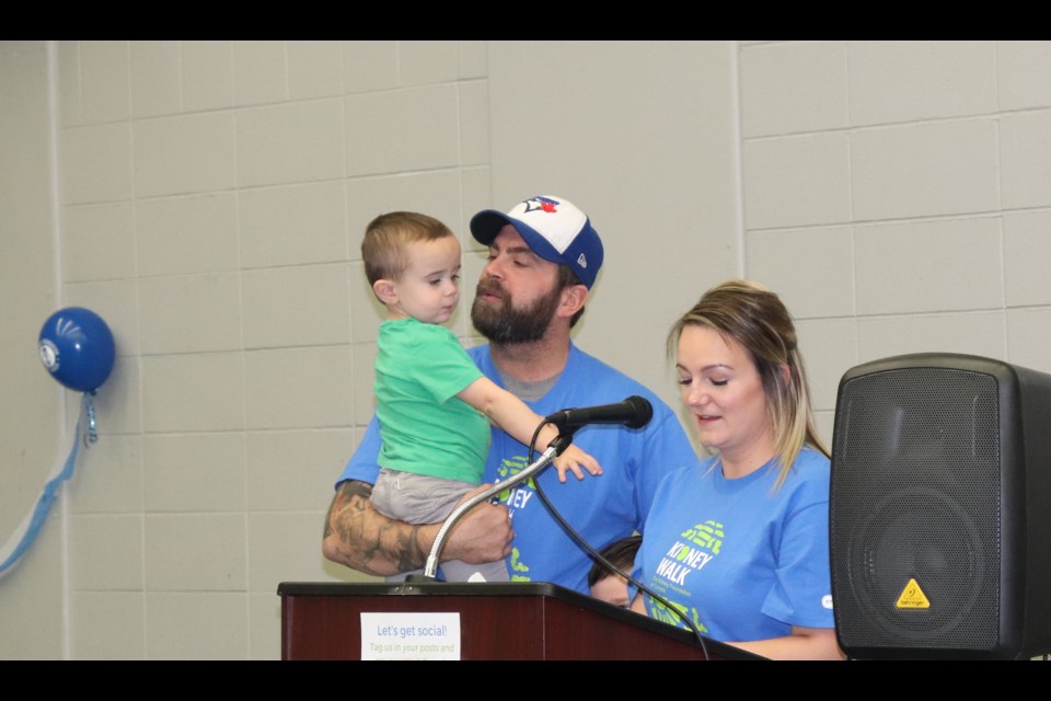 Lucas Everitt, his dad Ryan and mom Natasha speak at the 11th annual Kidney Walk. (via Hanna Petersen)