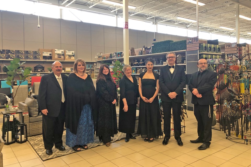 Mayor Lyn Hall and representatives from the three partner arts groups in Canadian Tire. (via Hanna Petersen)