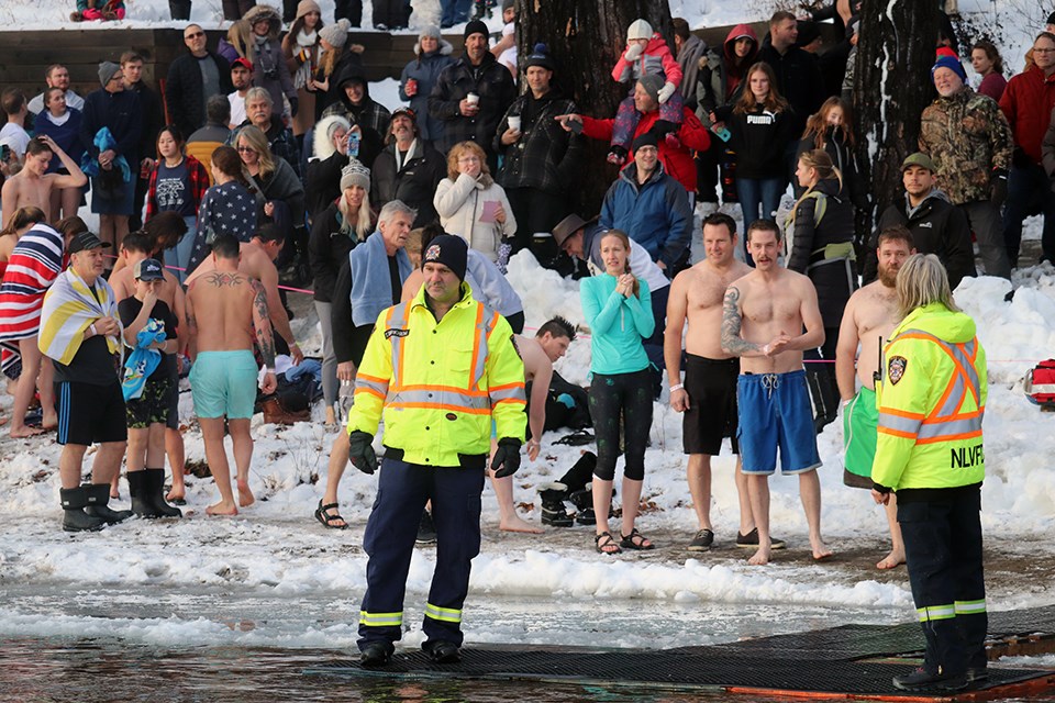 Prince George residents dared to dive into Ness Lake's frigid waters for the 2020 Polar Bear Dip. (via Kyle Balzer, PrinceGeorgeMatters)