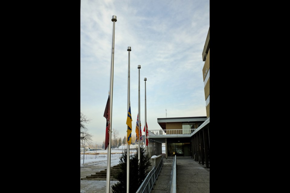 Flags fly in front of Prince George City Hall at half-mast in honour of Mary Gouchie, who passed away on Jan. 24, 2019 (via City of Prince George)