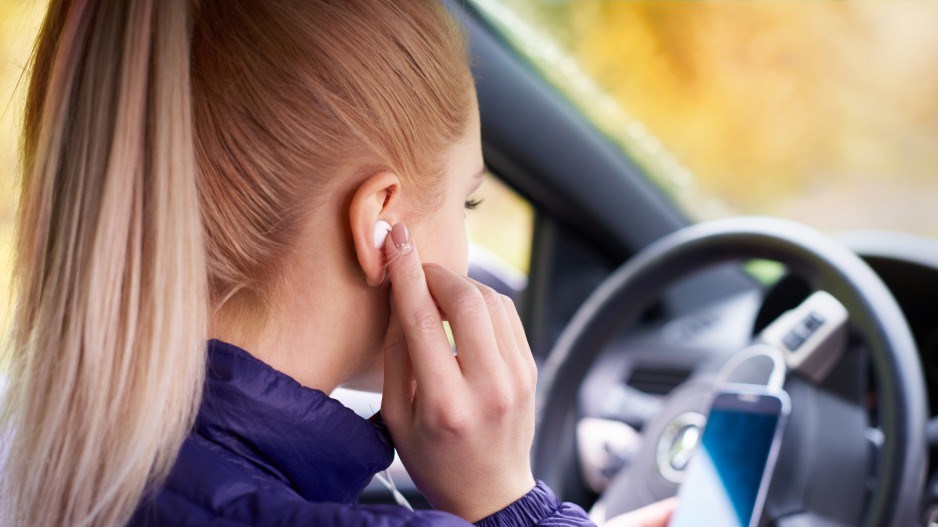 Driving with earbuds - Getty Images