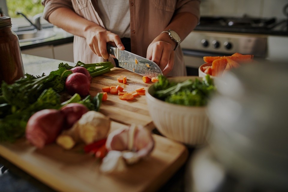 Health and nutrition vegetables kitchen eating cooking - Getty Images