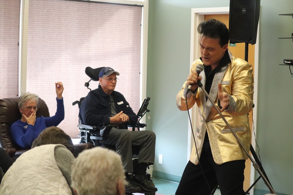 Steve Elliot performs as Elvis Presley for an audience at Rainbow Adult Day Centre. (via Hanna Petersen)