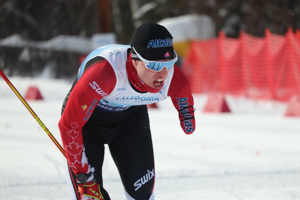 Mark Arendz (Canada) leans over in anxiety after winning the silver medal in the Men's Standing Long Distance biathlon at the 2019 World Para Nordic Skiing Championships in Prince George (via Kyle Balzer)