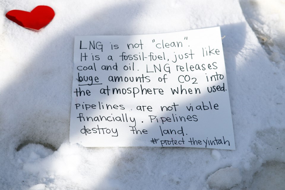Signs and residents of Prince George lined the streets outside of the downtown police detachment and Mr. PG in solidarity with Wet'suwet'en  First Nation hereditary chiefs and protesters that oppose the Coastal GasLink pipeline. (via Jess Fedigan)