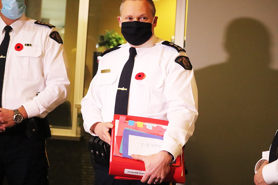 Supt. Shaun Write holds a binder full of thank you letters. (via Jess Fedigan)